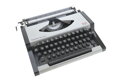 Kufříkový psací stroj AEG Olympia deluxe