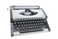 Kufříkový psací stroj AEG Olympia deluxe