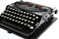 Psací stroj Remington Portable s kufříkem