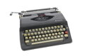 Kufříkový psací stroj Chevron